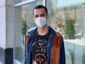 Portrait of masked woman with short hair