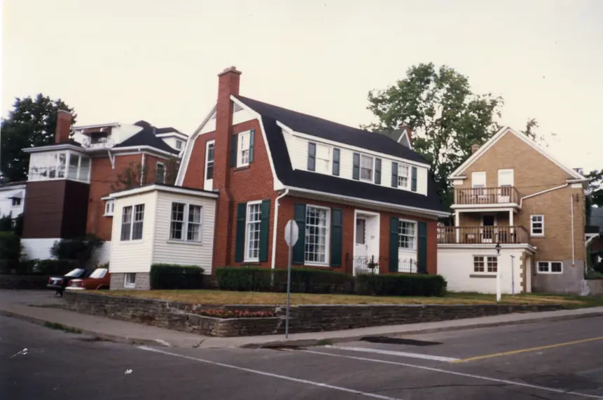 Voelker House on the corner - red brick exterior 