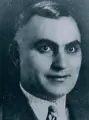 Black and white headshot photo of William Brill