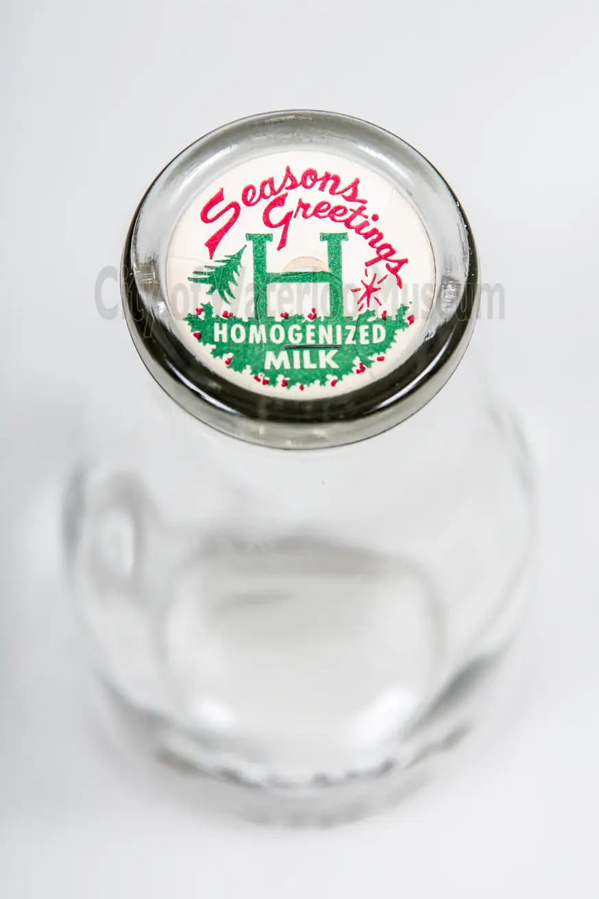 Milk Bottle showing the label and a top down view of the lid