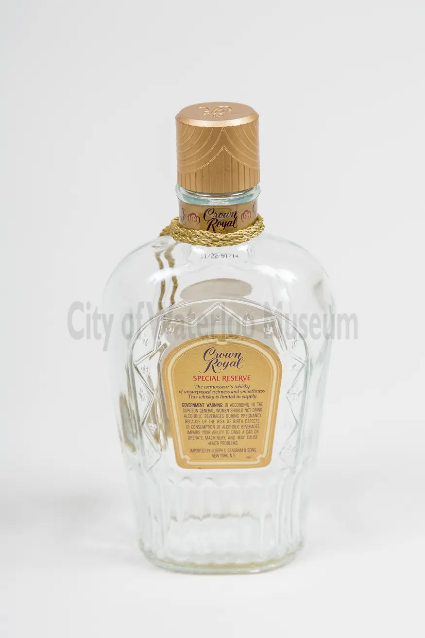 Back of Crown Royal Special Reserve Bottle with &quot;11/22/91/14&quot; stamped below the neck