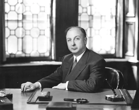 Image of man sitting at desk