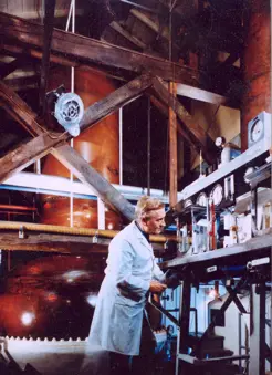 Image of man checking a hydrometer