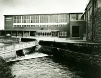 Exterior black and white image of the Seagram factory