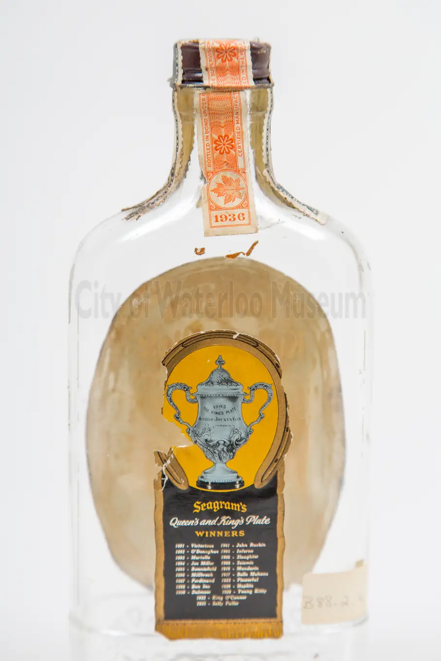 Back of bottle with label listing 20 Plate winners between 1891 and 1935