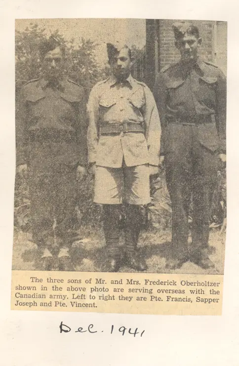 Image of three men in uniform