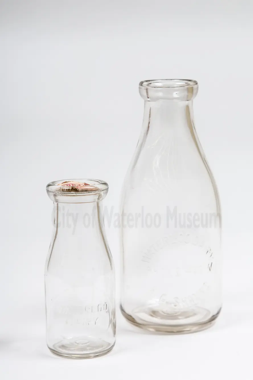 Two Milk Bottles of different sizes