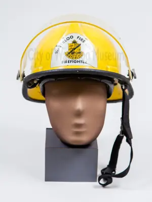 Yellow Fire Helmet modeled on a mannequin head for size reference