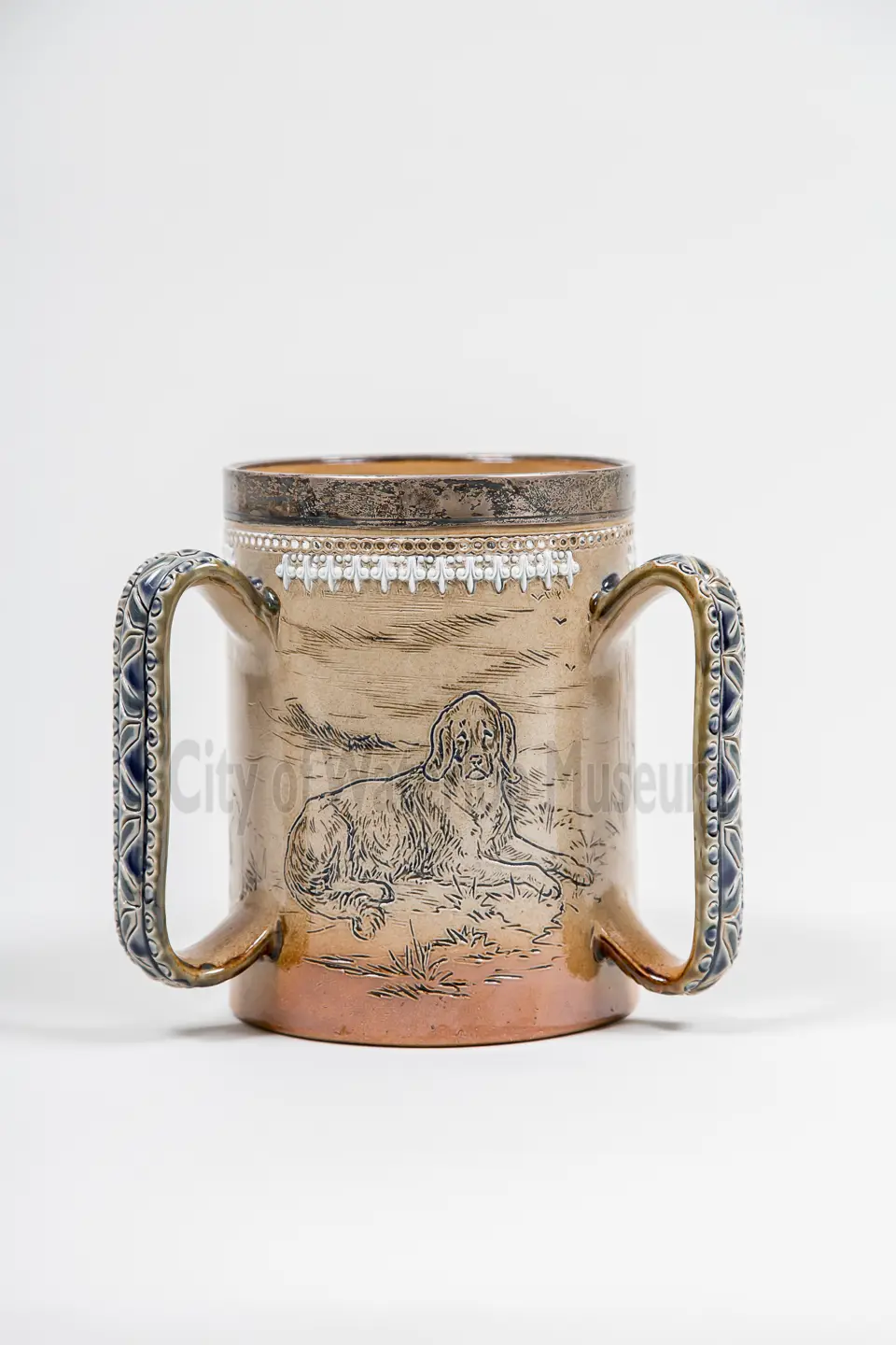 Loving Cup “Dog Cup” back of mug showing a dog lying down