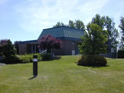 Charlie outside his Crematorium that he built/designed