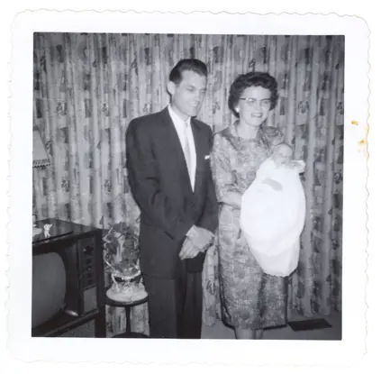 Image of man and woman with baby