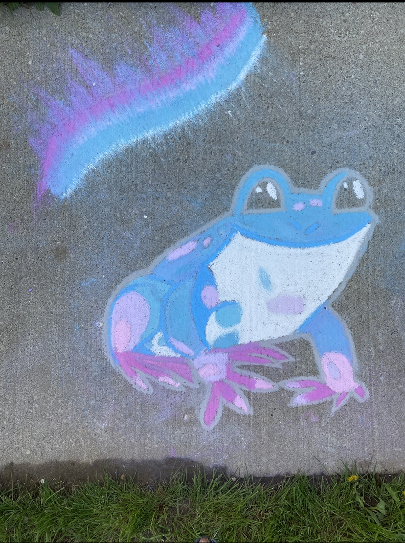 Image of a blue frog drawn with chalk 