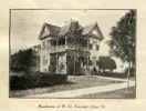 Black and white photo of a house. One woman is standing on the porch while a man leans against the stairs