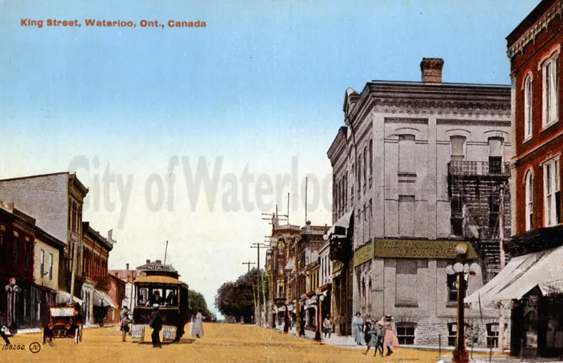 Front of postcard showing King Street in the 1800s in an illustration format