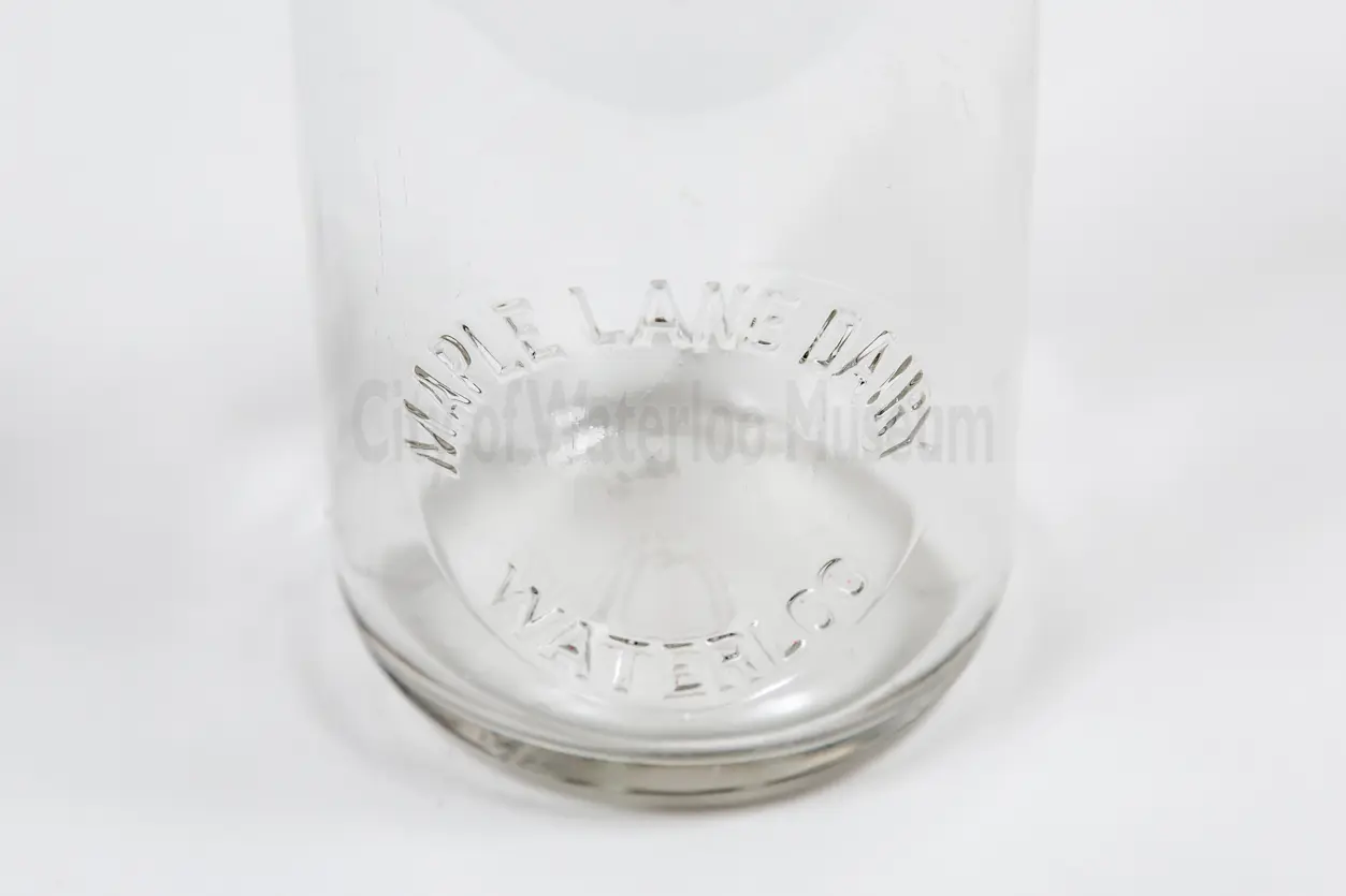 Maple lane dairy label on a milk bottle