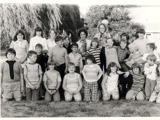 Image of 27 children posed in field