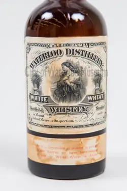 Waterloo Distillery White Wheat Whiskey in Amber Bottle