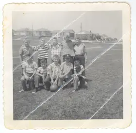 Image of ten kids in field