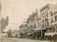 Black and white photo of King Street decorated for Saengerfest
