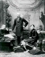 Black and white photo of Moore family seated and standing.