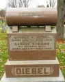 Photograph of the headstone of George and Nancie Diebel. 