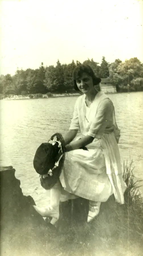 Black-and-white portrait featuring Lorraine Ritzer, Janson, and Musselman standing side by side in a park setting, all dressed in early-to-mid-20th-century attire.