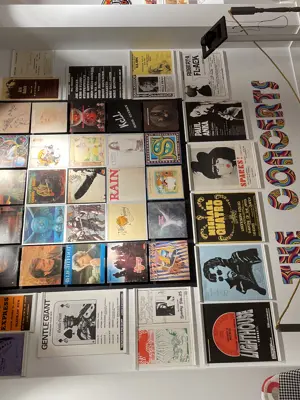 Album covers displayed on wall